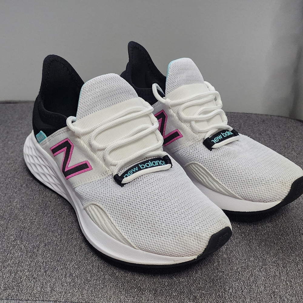 New Balance Women's White and Black Sneakers with Pink Accents